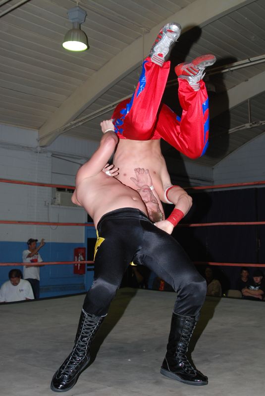 Derek Ryze executing a suplex on Stoney Hooker.